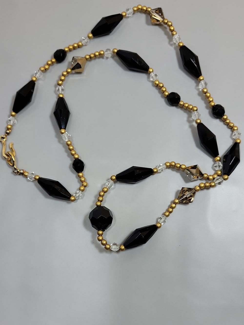 Black, golden and clear beads necklace